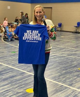  principal holding shirt